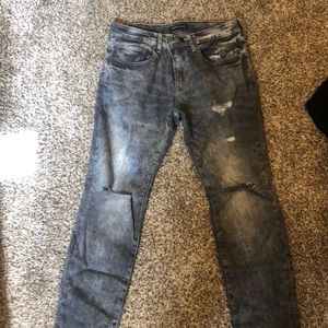 Black faded grey ripped jeans